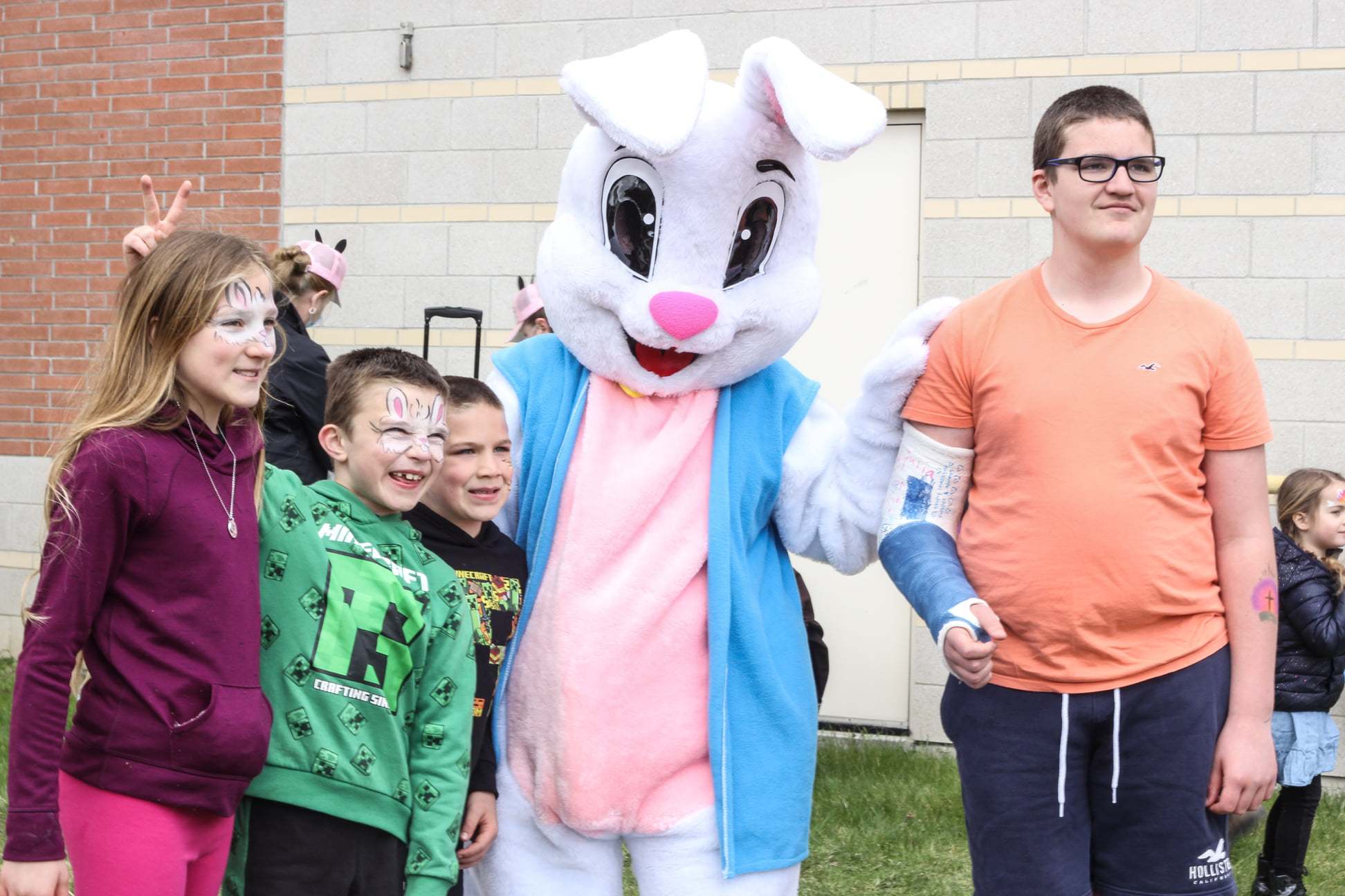 Children standing with Easter Bunny