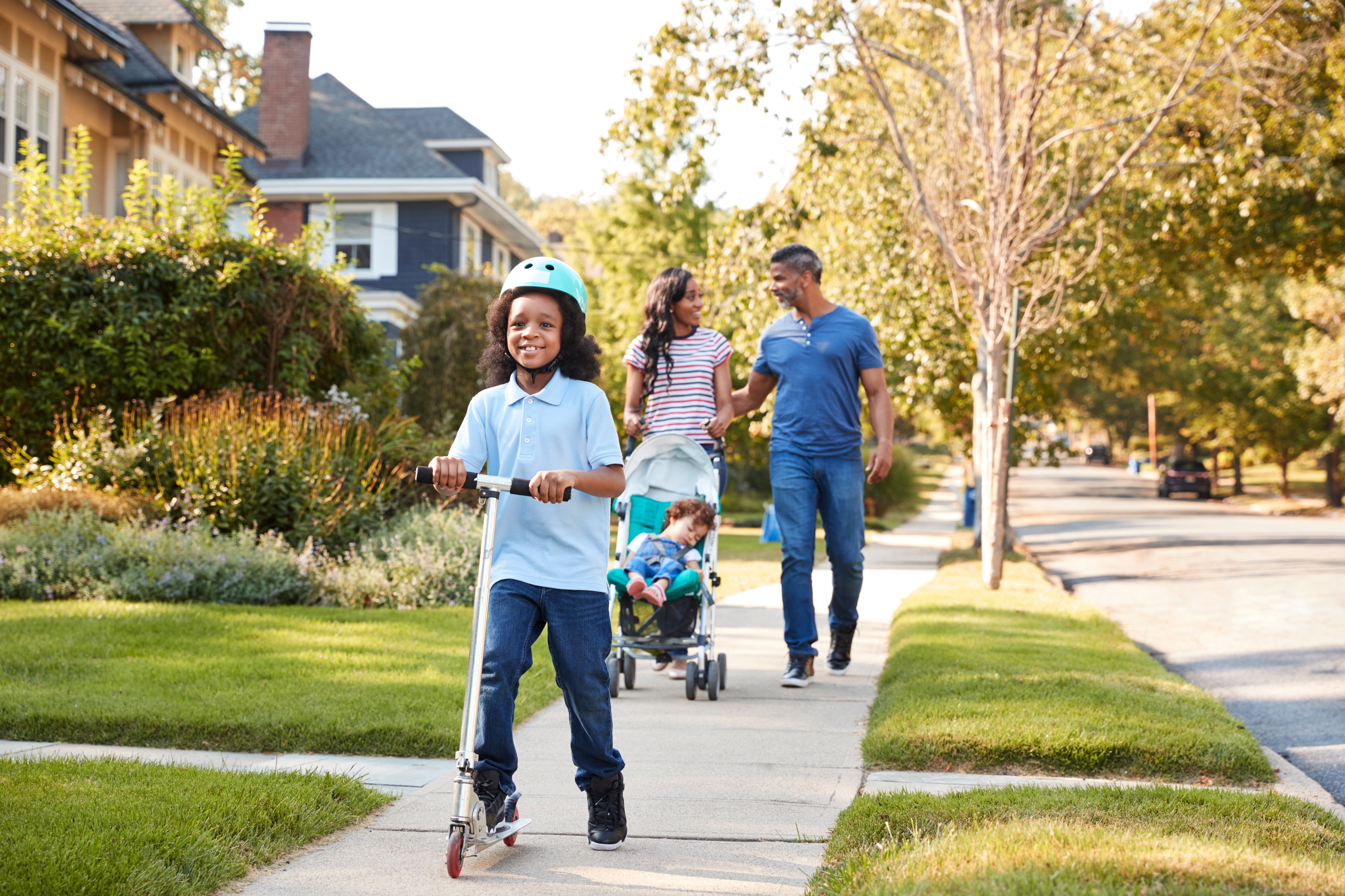 Family walk on sidewalk 