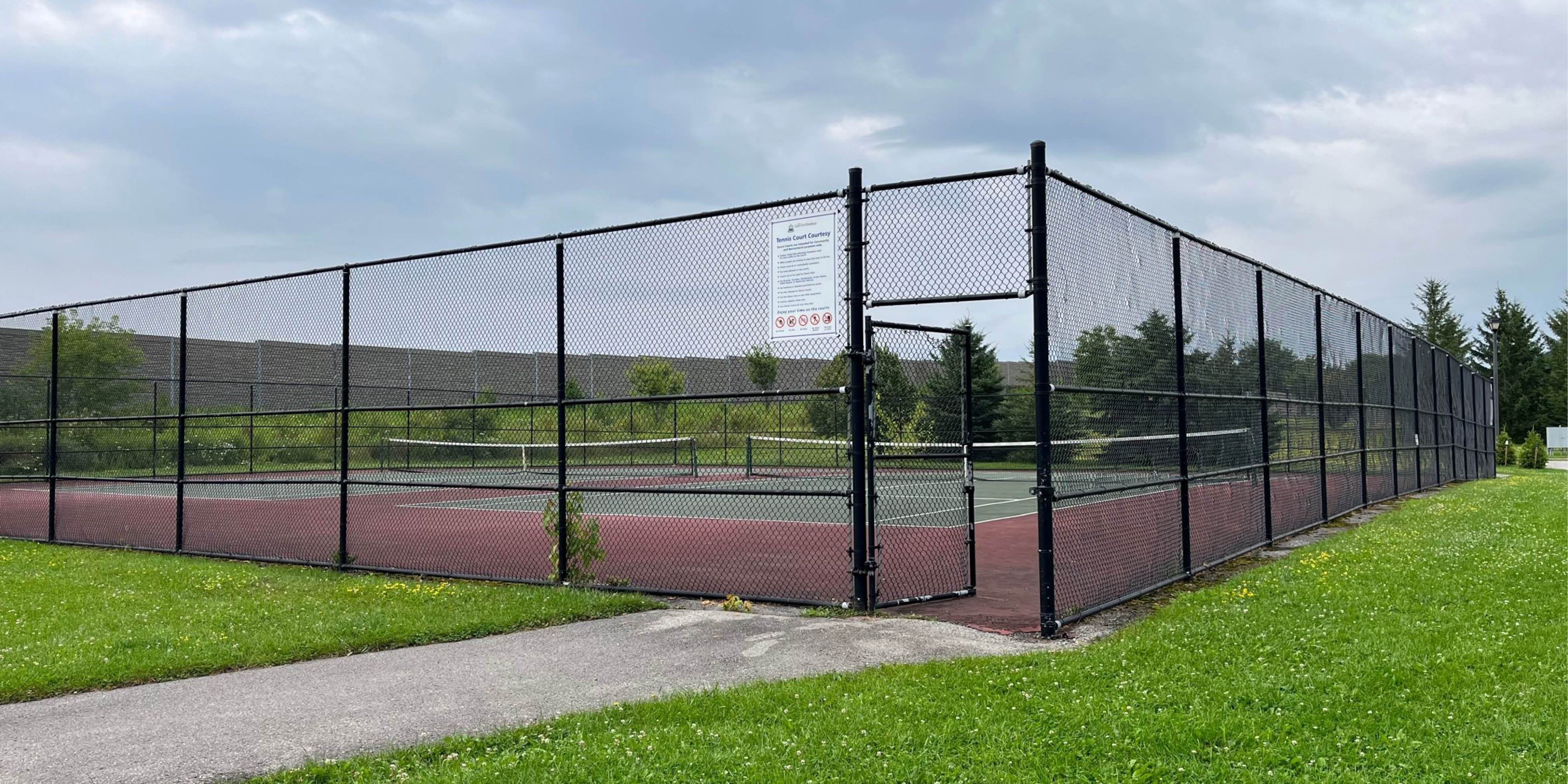 Fenced tennis courts 
