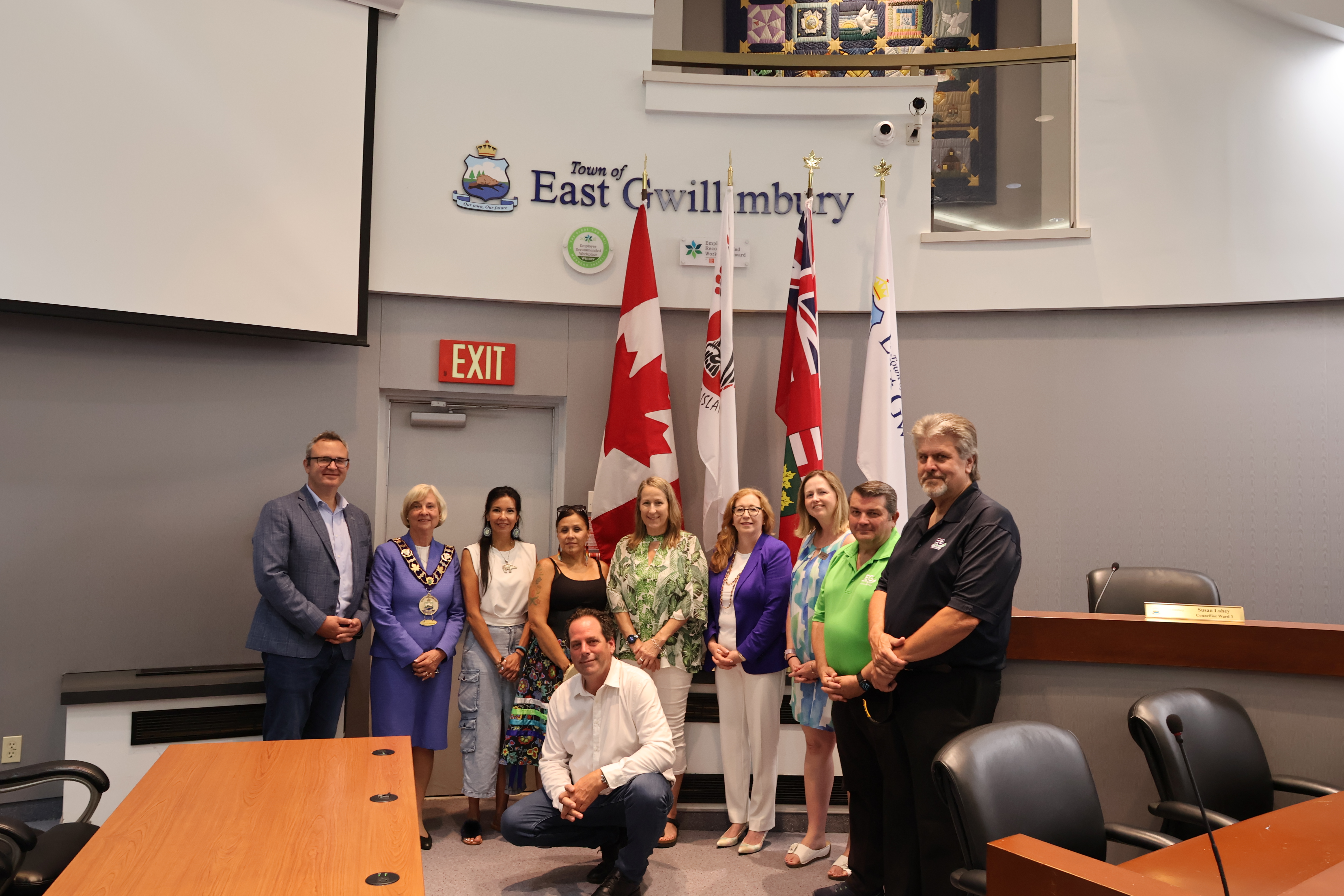Mayor and Council in Council Chambers with the new Georgina Island First Nation Flag
