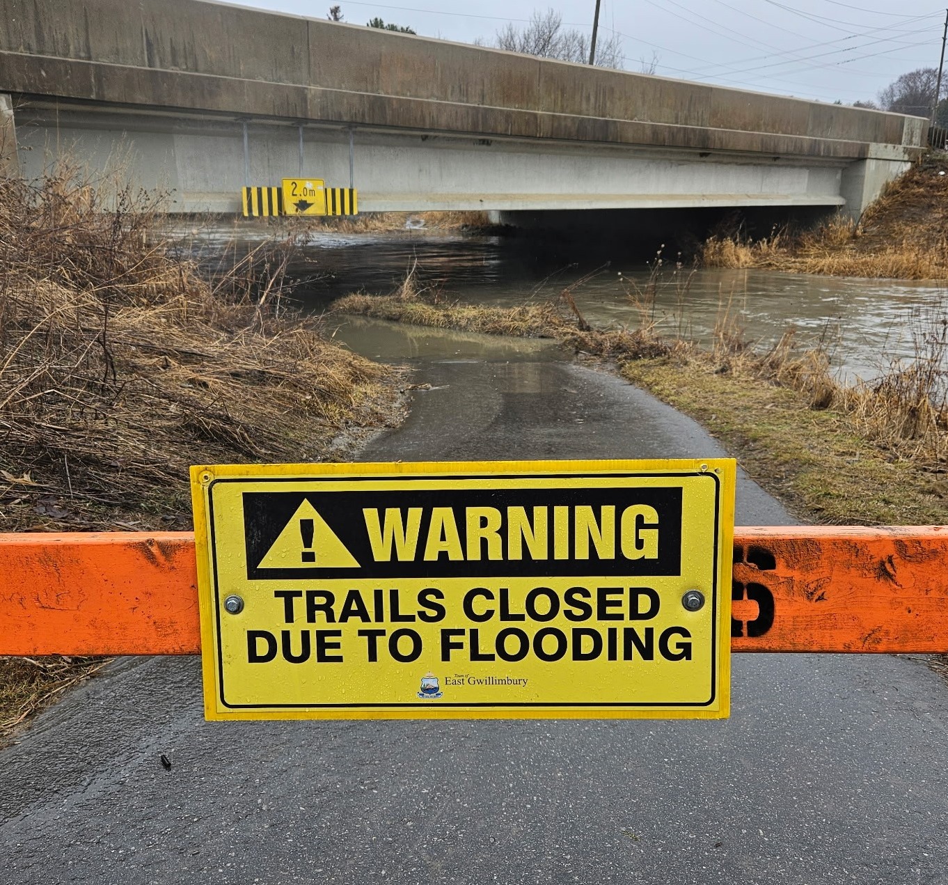 The photo is of the Nokiidaa Trail. There is a sign on the trail that says closed. 
