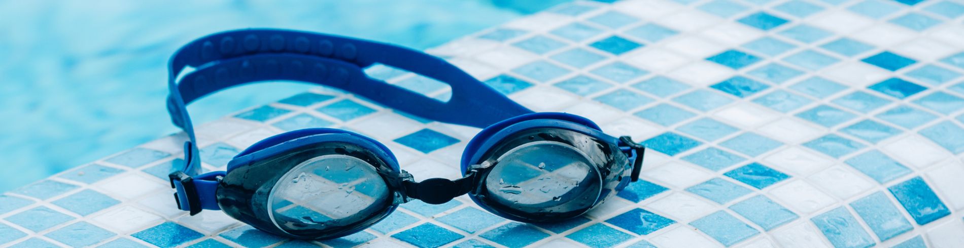 Goggles on swimming pool