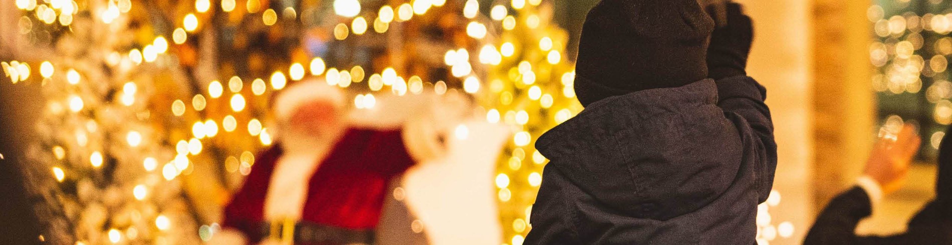 Child watching Santa in parade