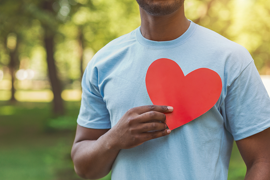 Person holding a heart