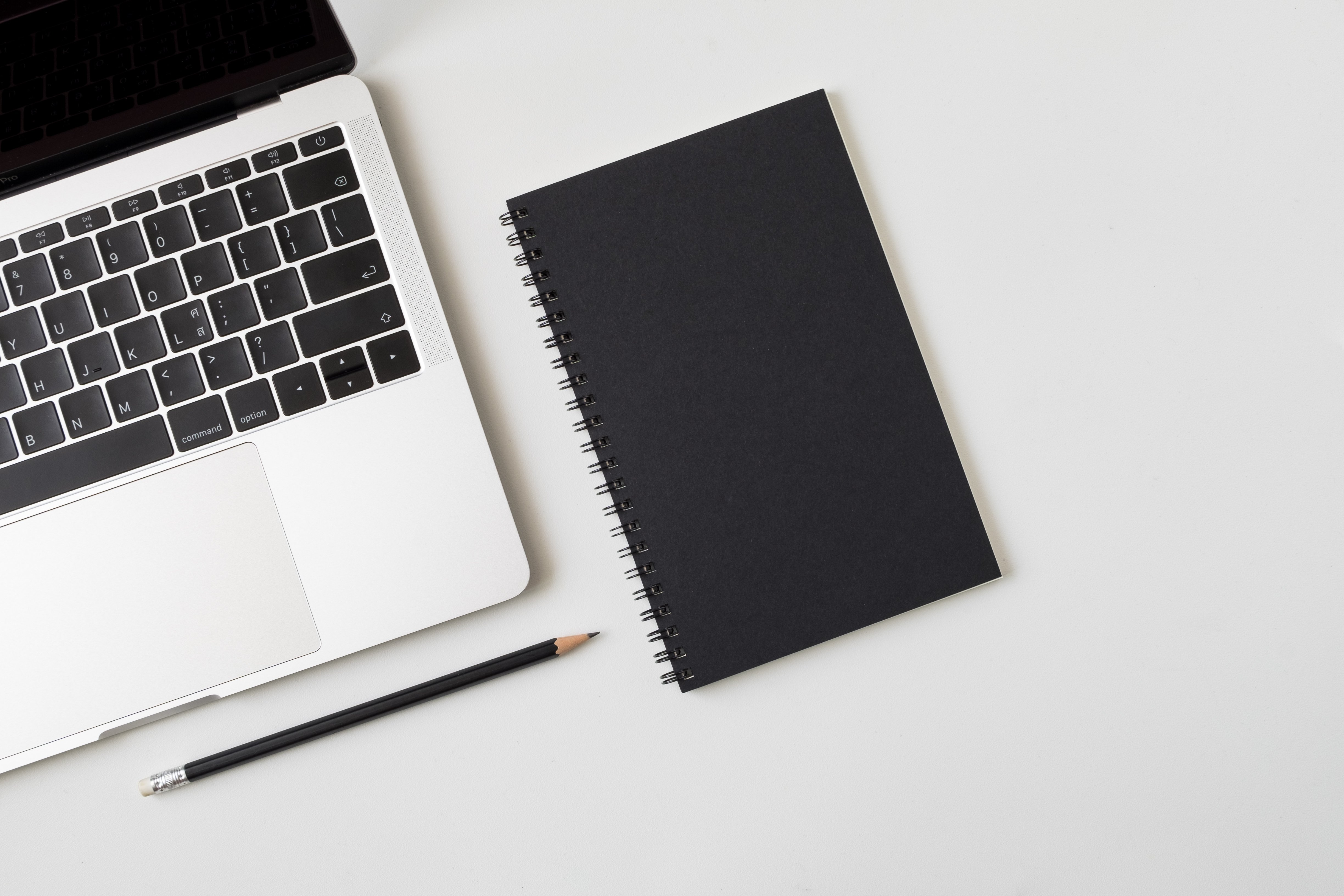Notepad and laptop