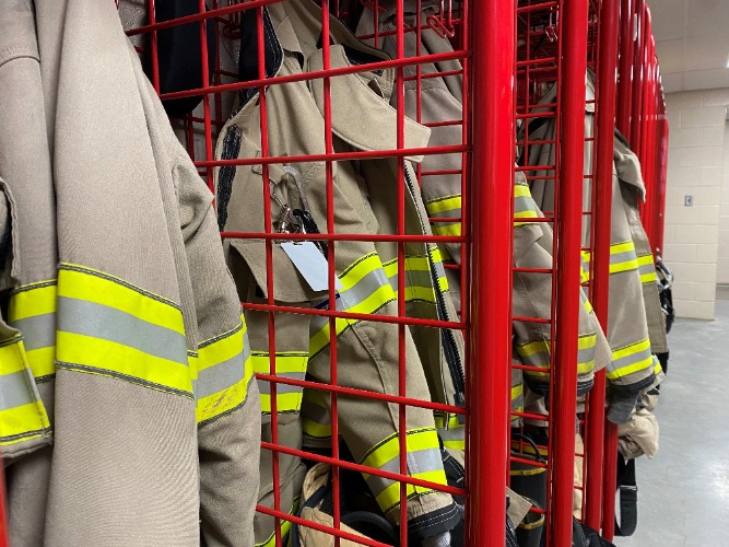 Bunker gear hanging on hooks