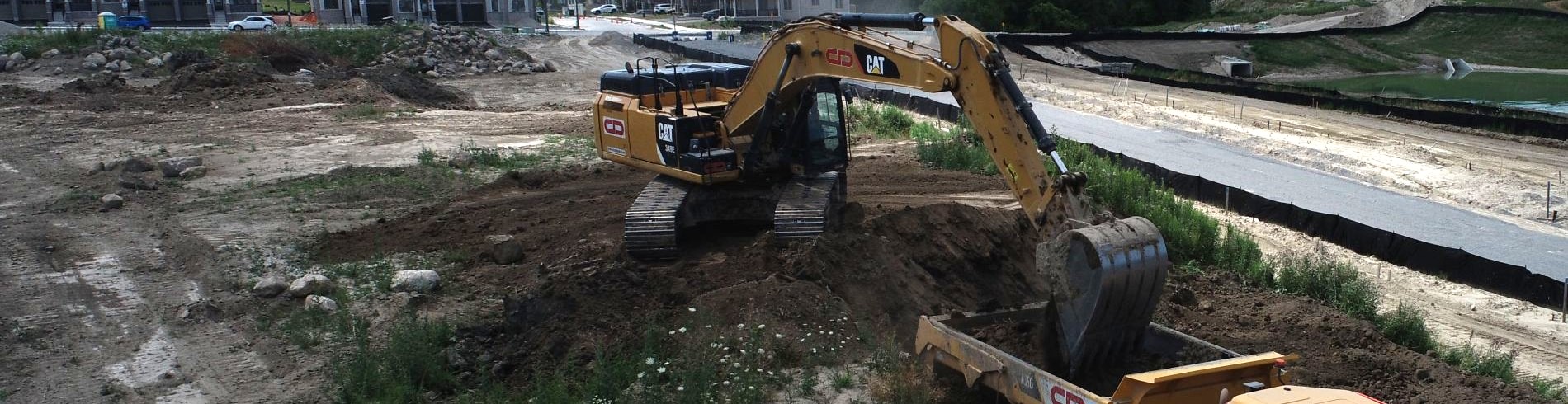 Loading dirt into a truck
