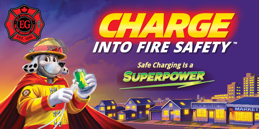 Cartoon Sparky the fire dog with a smoke alarm
