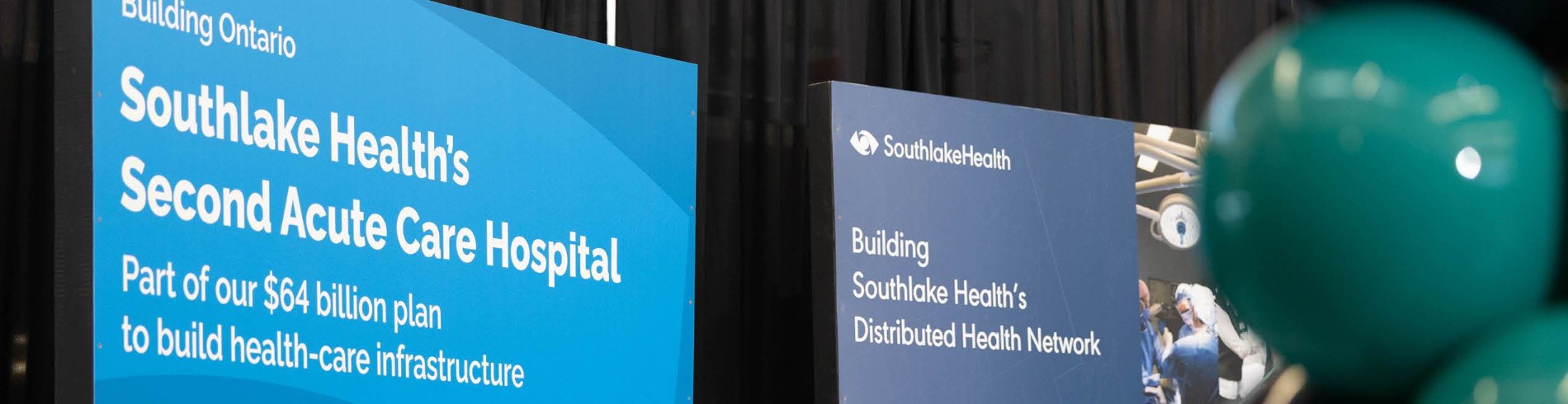 Construction signage with Southlake Health's Second Acute Care Hospital
